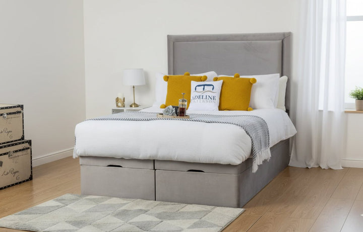 Ottoman beds UK with gas lift storage open to show under bed space